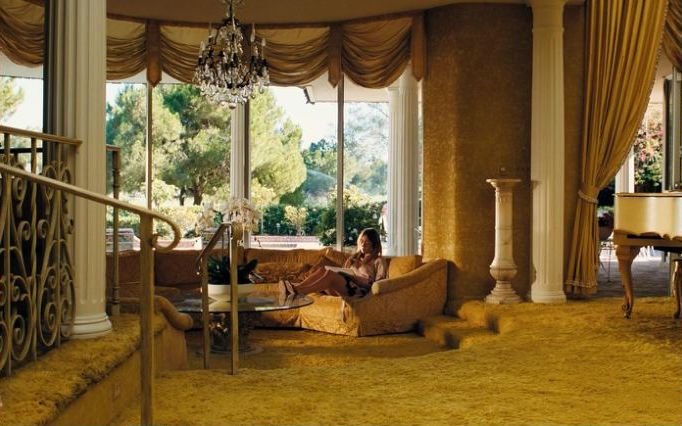 A gilded suburban living room