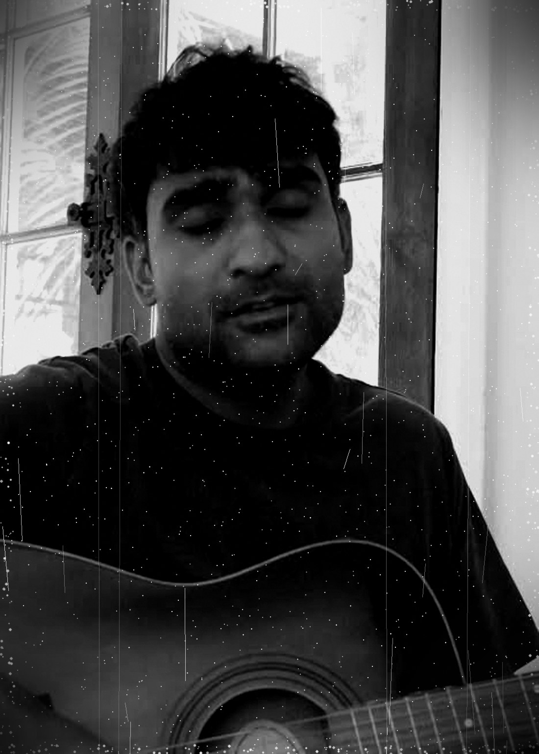 Tarush playing, eyes closed